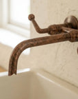 Rustic Aged Copper Wall Faucet with Crossbar Lever Handles