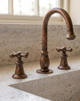Aged Copper Widespread Bathroom Faucet with Cross Handles