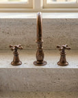 Aged Copper Widespread Bathroom Faucet with Cross Handles