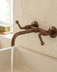 Rustic Aged Copper Wall Faucet with Crossbar Lever Handles