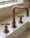 Aged Copper Widespread Bathroom Faucet with Cross Handles