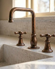Aged Copper Widespread Bathroom Faucet with Cross Handles
